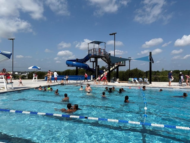 7013 Boyle Dr, Austin, TX 78724 - community pool featuring a water slide
