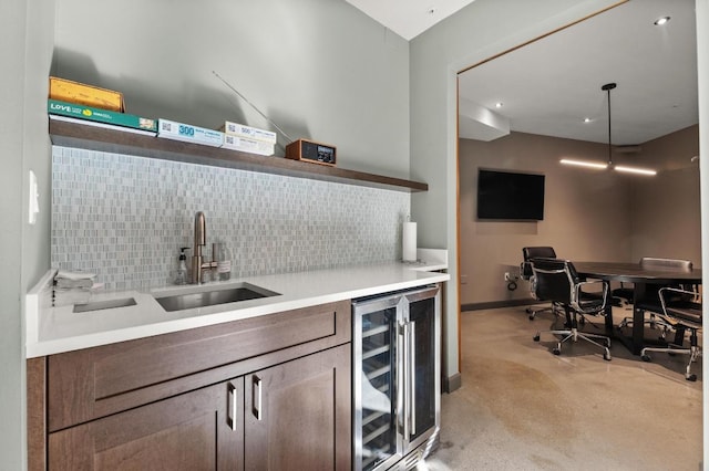 54 Rainey St Unit 1018, Austin, TX 78701 - community bar area featuring wine cooler, tasteful backsplash, and light colored carpet