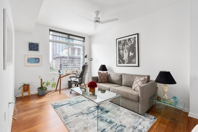 54 Rainey St Unit 1018, Austin, TX 78701 - living area with wood finished floors and ceiling fan