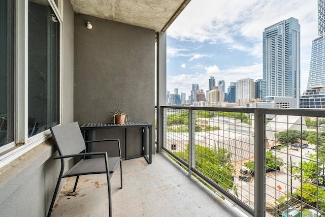 54 Rainey St Unit 1018, Austin, TX 78701 - balcony featuring a skyline view
