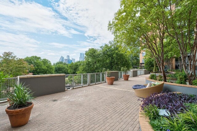 54 Rainey St Unit 1018, Austin, TX 78701 - view of patio with a view of skyline