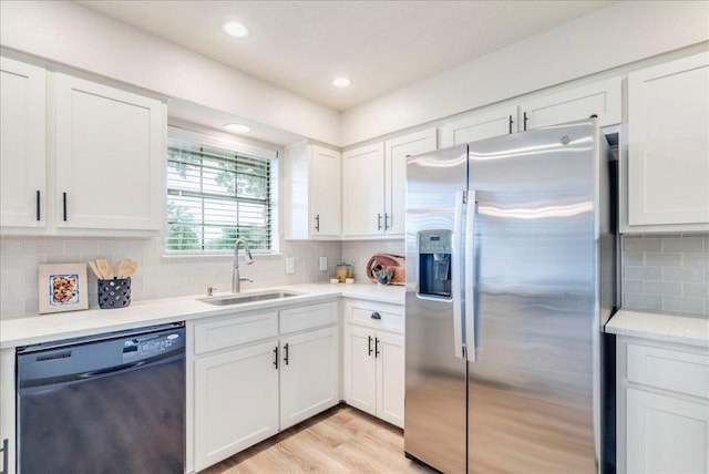 206 Live Oak Dr, Mountain City, TX 78610 - kitchen with stainless steel fridge with ice dispenser, dishwasher, tasteful backsplash, white cabinetry, and recessed lighting