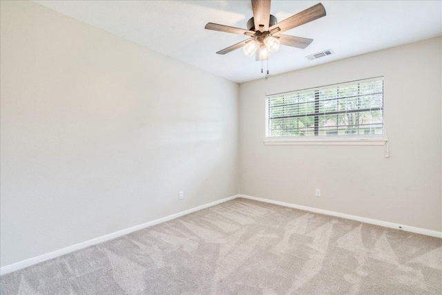 206 Live Oak Dr, Mountain City, TX 78610 - spare room featuring carpet flooring and a ceiling fan