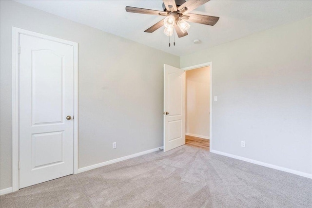 206 Live Oak Dr, Mountain City, TX 78610 - empty room with carpet floors and ceiling fan