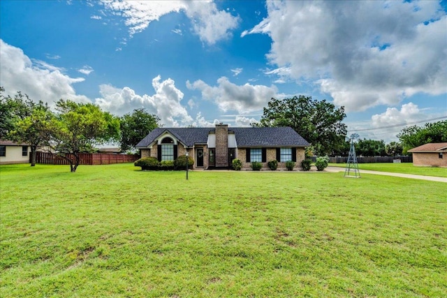 206 Live Oak Dr, Mountain City, TX 78610 - view of front of home with a chimney
