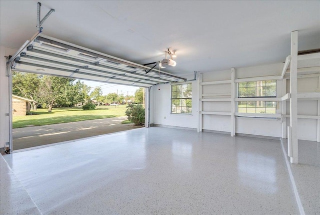 206 Live Oak Dr, Mountain City, TX 78610 - garage featuring baseboards