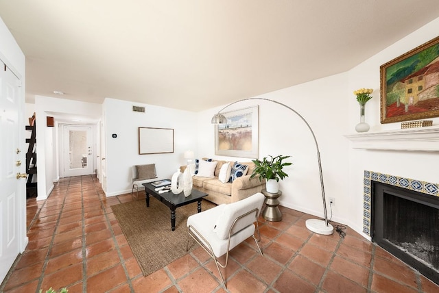 3617 Las Colinas Dr Unit B, Austin, TX 78731 - living room with a tile fireplace and tile patterned flooring