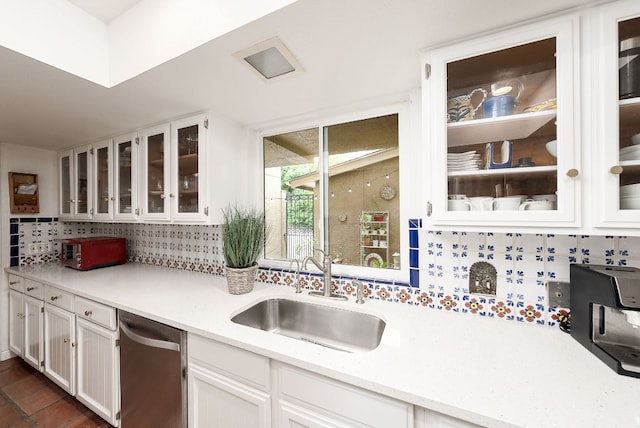3617 Las Colinas Dr Unit B, Austin, TX 78731 - kitchen with dishwasher, tasteful backsplash, light countertops, white cabinets, and glass insert cabinets