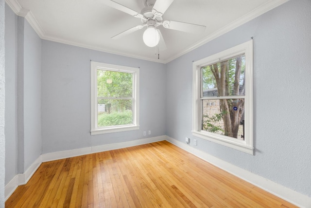 5513 Jim Hogg Ave, Austin, TX 78756 - spare room with light wood-type flooring, ornamental molding, and ceiling fan