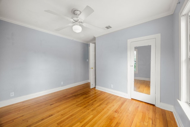 5513 Jim Hogg Ave, Austin, TX 78756 - unfurnished room with ornamental molding, light wood-type flooring, and ceiling fan