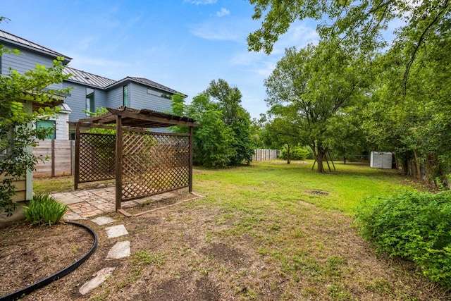 5513 Jim Hogg Ave, Austin, TX 78756 - fenced backyard with a pergola and a patio