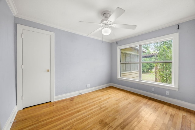 5513 Jim Hogg Ave, Austin, TX 78756 - spare room featuring ornamental molding, light wood finished floors, and ceiling fan