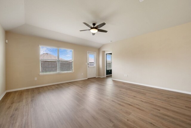 15212 Shell Bark Cv, Austin, TX 78724 - unfurnished room featuring ceiling fan, wood finished floors, and lofted ceiling