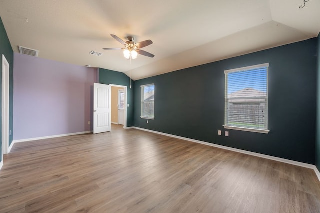 15212 Shell Bark Cv, Austin, TX 78724 - spare room with a ceiling fan, vaulted ceiling, and wood finished floors