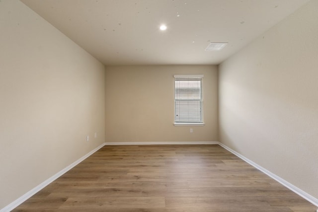 15212 Shell Bark Cv, Austin, TX 78724 - spare room with light wood finished floors and recessed lighting
