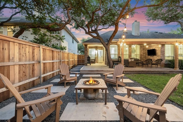 10408 Hansa Dr, Austin, TX 78739 - fenced backyard with a patio area and an outdoor living space with a fire pit