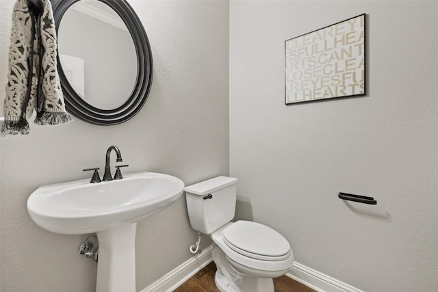 10408 Hansa Dr, Austin, TX 78739 - bathroom with toilet and wood finished floors