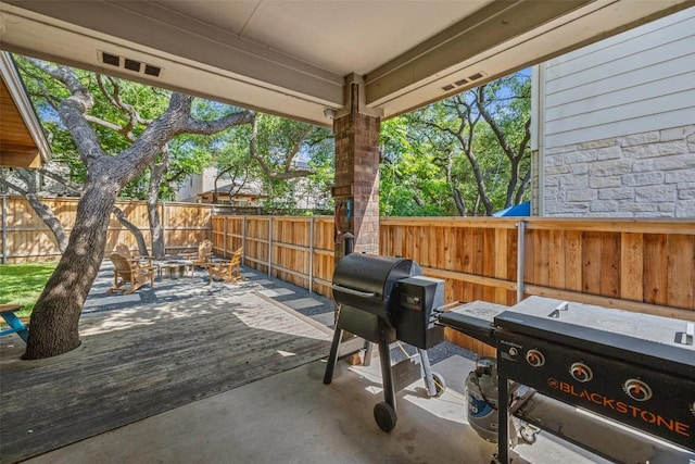 10408 Hansa Dr, Austin, TX 78739 - fenced backyard featuring a deck and grilling area