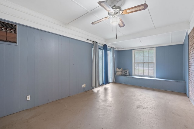 10000 Gail Rd, Austin, TX 78748 - empty room featuring concrete floors, ceiling fan, and wood walls