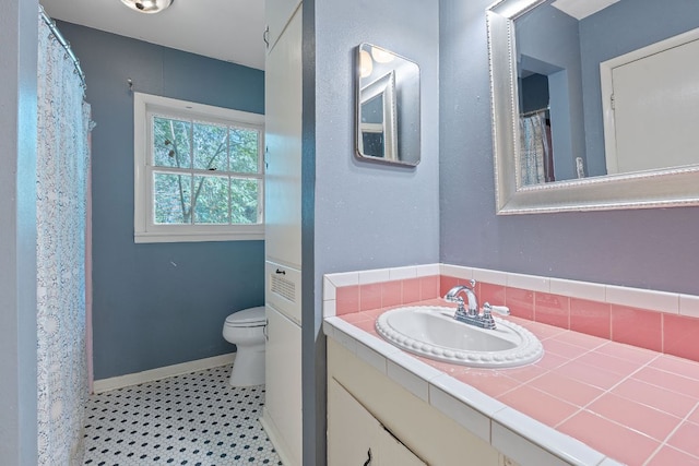 10000 Gail Rd, Austin, TX 78748 - full bathroom with vanity and tasteful backsplash