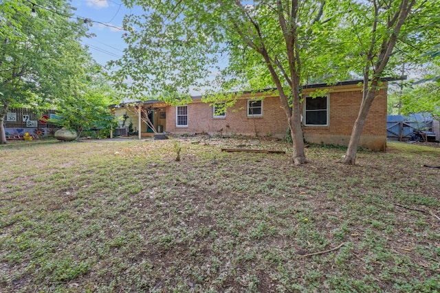 10000 Gail Rd, Austin, TX 78748 - rear view of house featuring brick siding