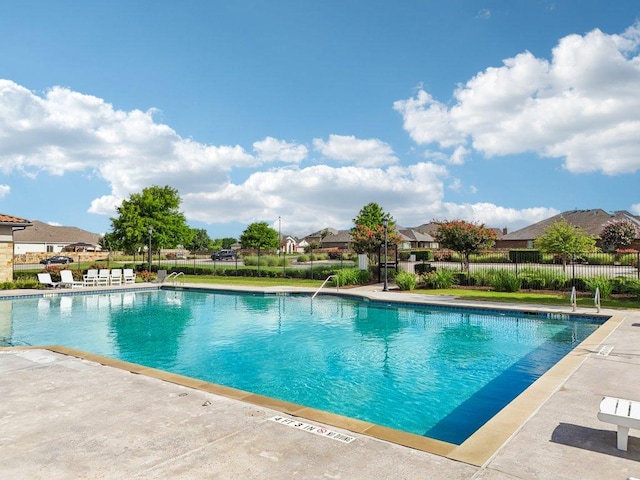 16601 Aventura Ave, Pflugerville, TX 78660 - community pool featuring a patio area and a residential view