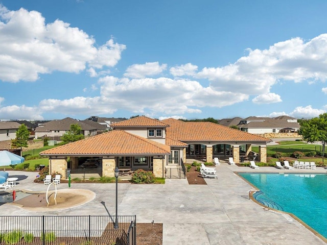 16601 Aventura Ave, Pflugerville, TX 78660 - community pool featuring a patio area and a residential view
