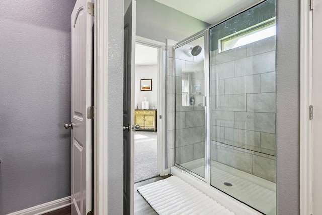 16601 Aventura Ave, Pflugerville, TX 78660 - bathroom featuring a stall shower and a textured wall