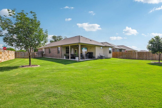 16601 Aventura Ave, Pflugerville, TX 78660 - rear view of house with a fenced backyard and a patio