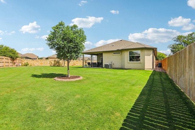 16601 Aventura Ave, Pflugerville, TX 78660 - rear view of house featuring a fenced backyard, stucco siding, and a wall mounted air conditioner