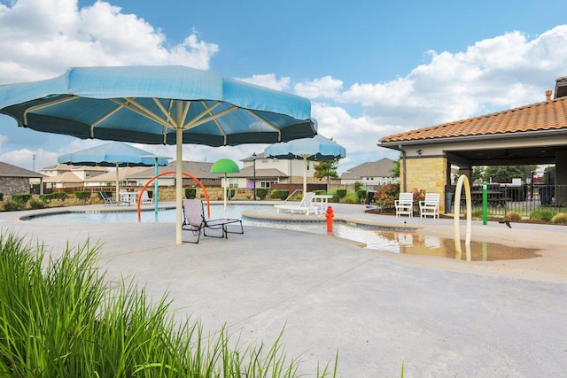 16601 Aventura Ave, Pflugerville, TX 78660 - surrounding community featuring a pool and a patio area