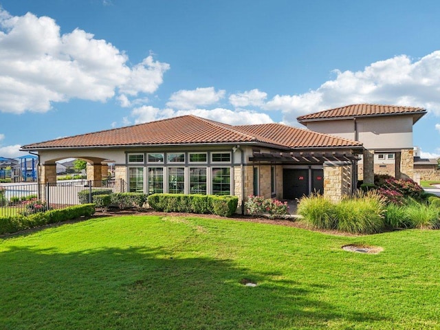16601 Aventura Ave, Pflugerville, TX 78660 - back of house with stone siding, a tile roof, and stucco siding