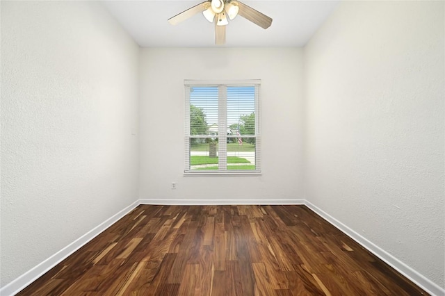 301 Crane St, Austin, TX 78734 - unfurnished room featuring ceiling fan and dark wood-style flooring