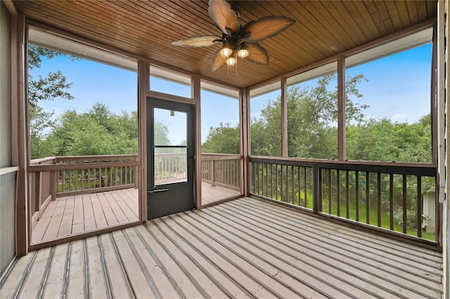 301 Crane St, Austin, TX 78734 - unfurnished sunroom featuring a ceiling fan