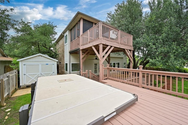 301 Crane St, Austin, TX 78734 - rear view of house with a shed, a wooden deck, and outdoor dining area