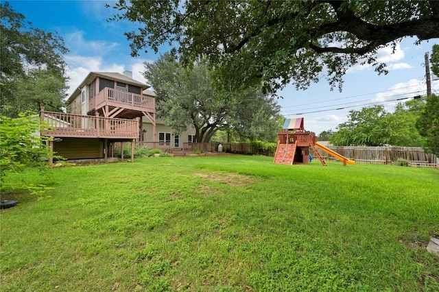 301 Crane St, Austin, TX 78734 - fenced backyard with a playground and a wooden deck