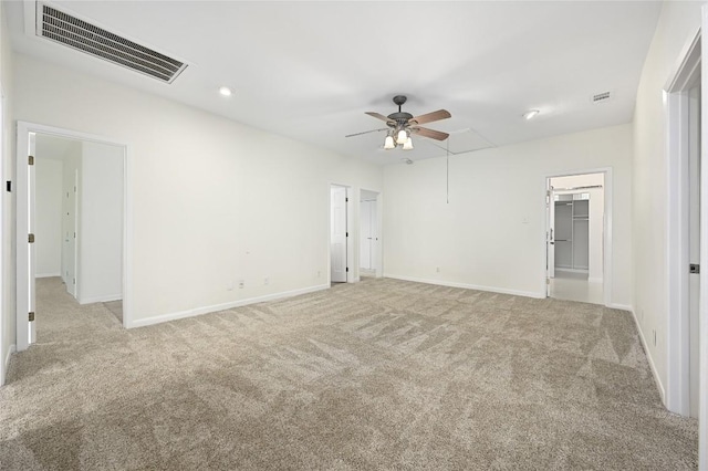 301 Crane St, Austin, TX 78734 - empty room with attic access, ceiling fan, carpet, and recessed lighting