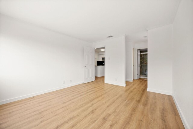 8888 Tallwood Dr Unit 1202, Austin, TX 78759 - unfurnished room with light wood-style flooring and baseboards
