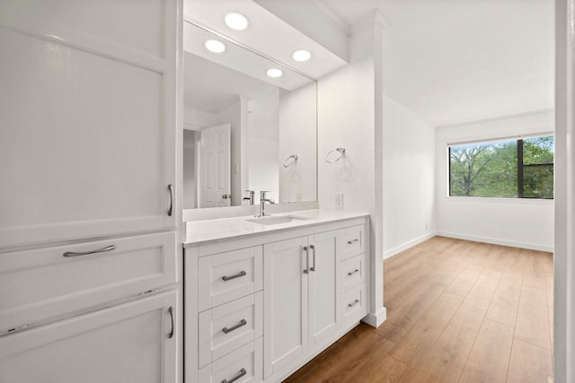 8888 Tallwood Dr Unit 1202, Austin, TX 78759 - bathroom with vanity, recessed lighting, and wood finished floors