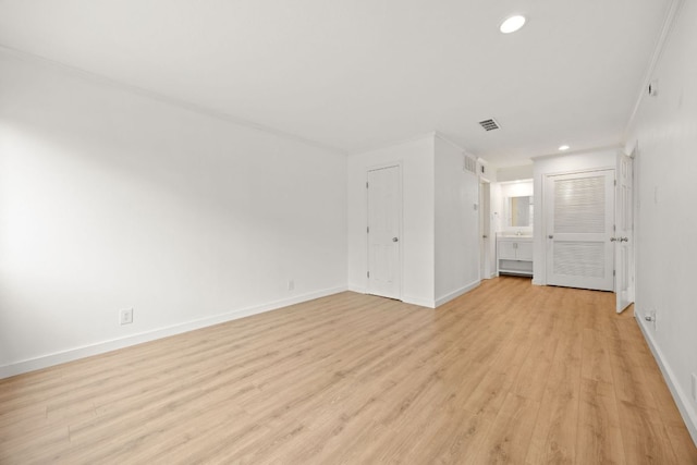 8888 Tallwood Dr Unit 1202, Austin, TX 78759 - unfurnished room with light wood-type flooring and recessed lighting
