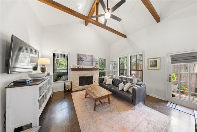 2616 Jefferson St Unit A, Austin, TX 78703 - living area with high vaulted ceiling, beamed ceiling, a fireplace, dark wood-type flooring, and a ceiling fan