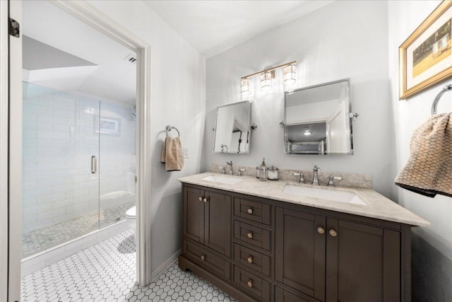 2616 Jefferson St Unit A, Austin, TX 78703 - bathroom with double vanity, a stall shower, and tile patterned flooring