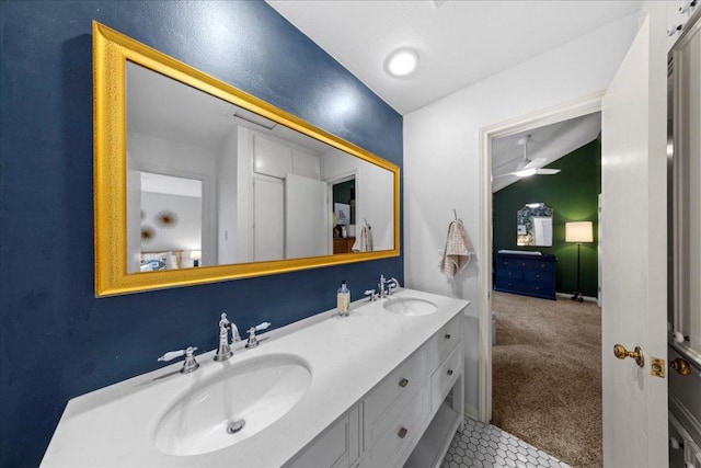 2616 Jefferson St Unit A, Austin, TX 78703 - full bath featuring double vanity, tile patterned floors, a ceiling fan, and lofted ceiling