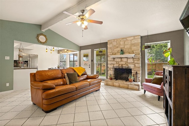 809 Windsor Rd, Round Rock, TX 78664 - living room with a fireplace, light tile patterned floors, and a ceiling fan