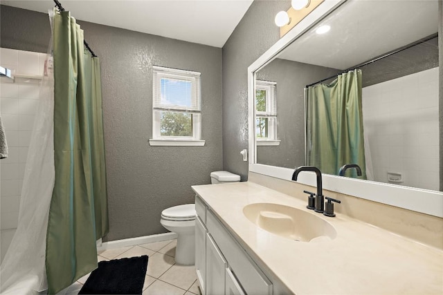 809 Windsor Rd, Round Rock, TX 78664 - bathroom featuring a textured wall, tile patterned flooring, vanity, and shower / bathtub combination with curtain