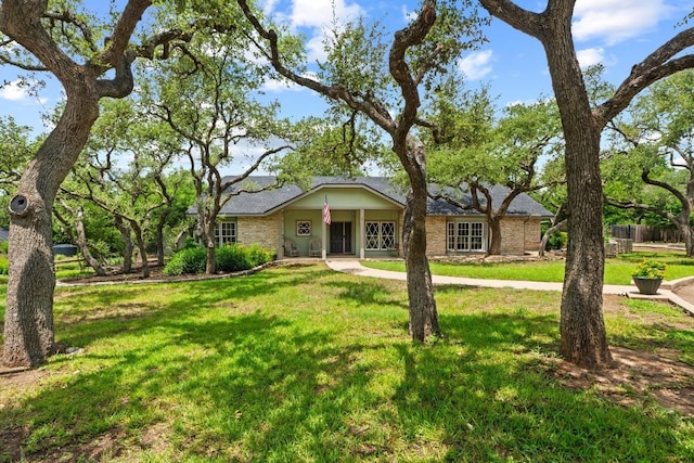 11302 Centennial Trl, Austin, TX 78726 - ranch-style home with a front yard