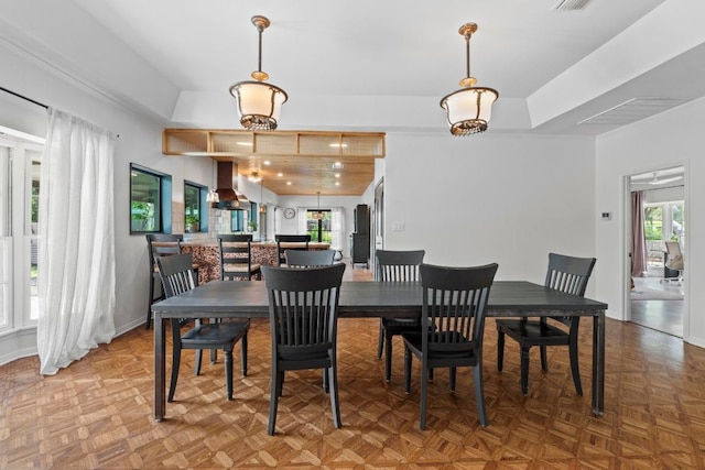 11302 Centennial Trl, Austin, TX 78726 - dining area featuring a raised ceiling and baseboards