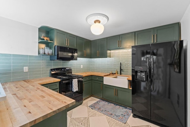 11302 Centennial Trl, Austin, TX 78726 - kitchen featuring black appliances, wooden counters, green cabinets, tasteful backsplash, and open shelves