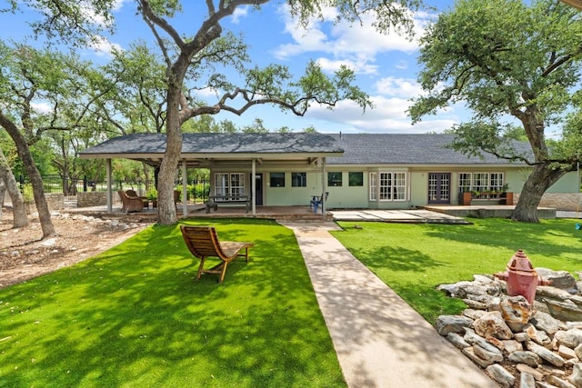 11302 Centennial Trl, Austin, TX 78726 - rear view of house featuring french doors, a yard, and a patio