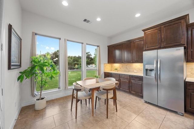 707 Campino Dr, Cedar Park, TX 78613 - kitchen featuring stainless steel fridge with ice dispenser, backsplash, light countertops, recessed lighting, and dark brown cabinets